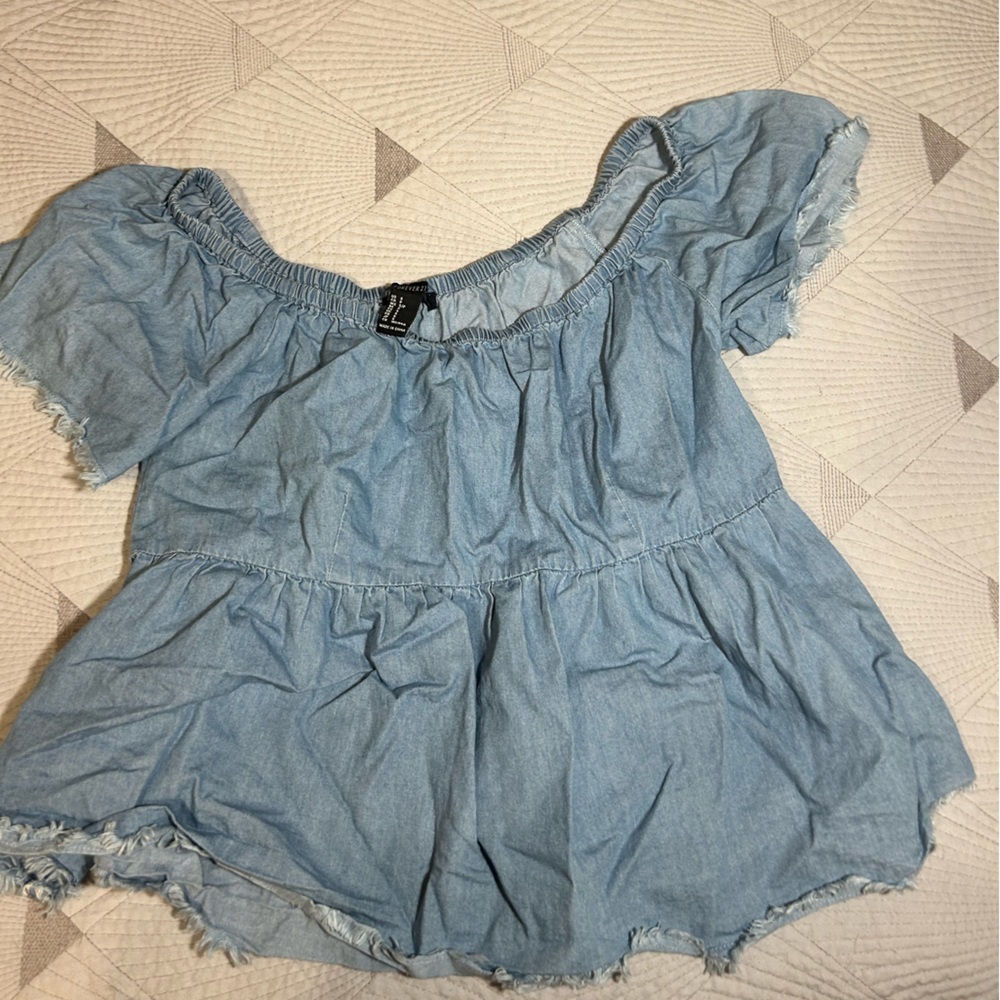 Over the shoulder blue jean top
